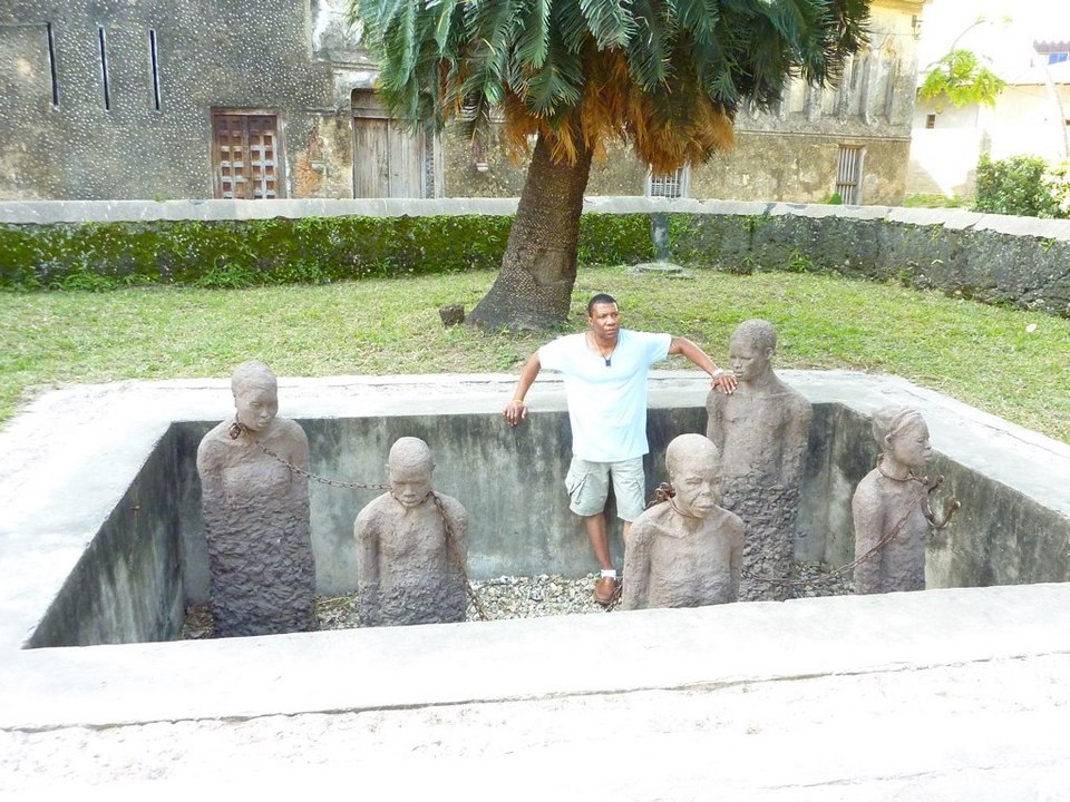 Kenny with the slave statues